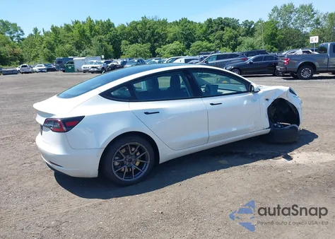 2021 Tesla Model 3 Standard Range Plus Rear-Wheel Drive from USA, damaged, VIN 5YJ3E1EA5MF085107